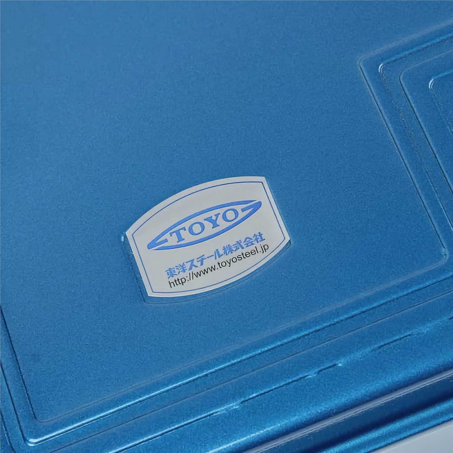 Toyo Steel T-360 Blue. Close-up view of the logo on the glossy blue toolbox, highlighting the detailed branding on its surface. 1.6kg.